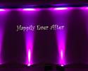 Purple Uplighting with Monogram